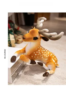 Close-up of realistic sika deer plush toy with soft brown fur and white spots