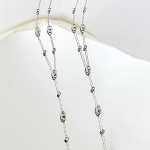 Elegant stainless steel pig nose necklace with sparkling zircons on white background