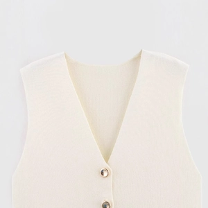 Chic beige V-neck knitted vest with amber buttons and elegant gold-trimmed details