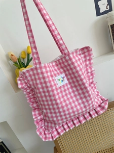 Pink and white checkered tote bag with ruffle edges and cute fun party embroidery