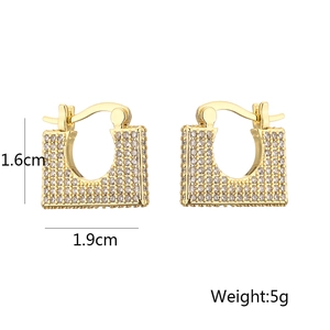 Detail view of gold rectangular earrings with cubic zirconia, size 1.6cm by 1.9cm