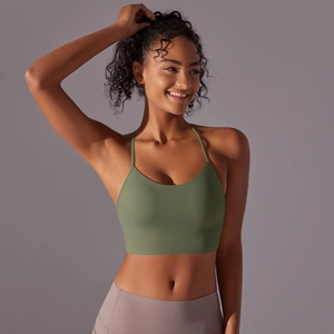 Women's olive green sports bra and mauve leggings set for yoga and fitness training