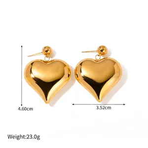 Polished gold heart drop earrings for women with dimensional 4.6cm length aesthetic