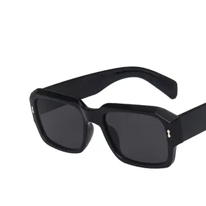 Classic oversized square black sunglasses with thick frames and metal rivet accents