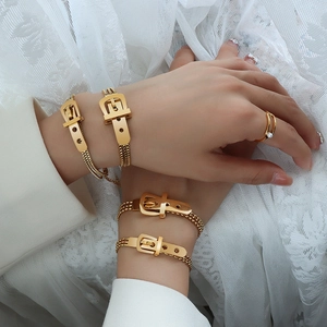 Elegant 18K gold plated stainless steel belt buckle bracelet and pearl ring set on model