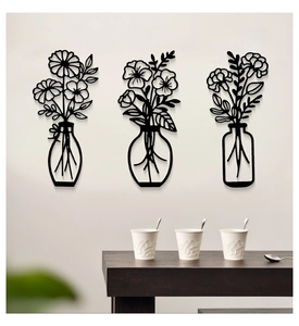 Juego de 3 piezas de arte de pared en metal negro con diseños de jarrones calados