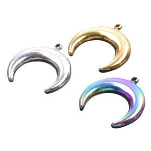 Three crescent moon metal charms in silver, gold, and iridescent rainbow colors