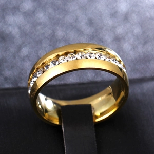 Macro shot of 6mm 316L gold-plated steel ring with sparkling round cubic zirconia stones