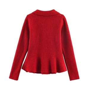 Red peplum knit cardigan with ruffled hem and long sleeves shown from a back view