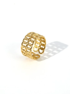 Detailed macro view of the 18k gold plated hollow woven chain pattern open ring