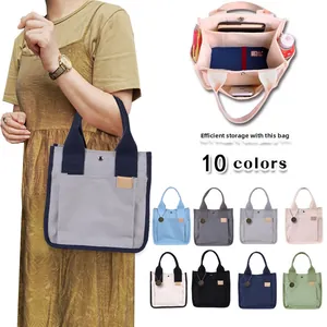 Internal view of canvas tote bag showing multiple compartments and multi-color selection