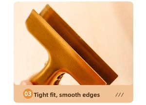 Close-up of golden brushed metal clip showing tight seal and smooth polished edges