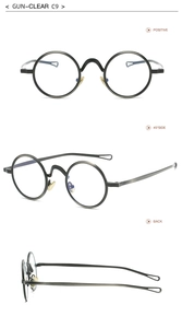 Detailansicht der runden Retro-Sonnenbrille in Gunmetal mit hohlen Bügelenden und klaren Gläsern