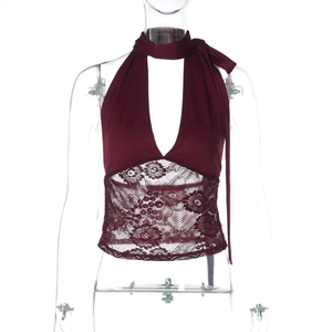 Detail of burgundy lace halter top showing deep V-neckline and intricate floral texture
