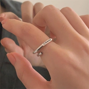 Minimalist S925 sterling silver smile engraved open ring with a crossed design for women