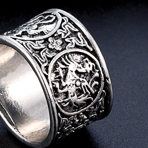 Retro punk style wide band ring with vintage dragon relief and oxidized silver finish