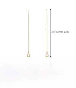 Detail view of 10.2cm long copper drop tassel earrings with gold finish and measurements