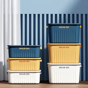 Stackable storage box set with lids in blue, yellow, and white for home organization