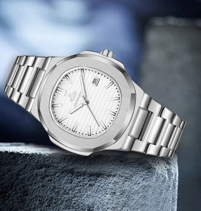 Octagonal silver quartz watch with white textured dial and calendar display on stone base