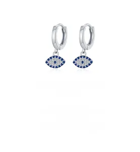 Macro shot of S925 sterling silver evil eye earrings with blue and white zircon pavé