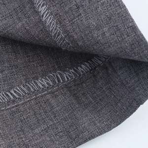 Women's dark gray casual blazer showing close-up of premium fabric texture and stitching