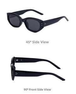 Detail view of black cat eye sunglasses featuring thick frames and silver metal accents