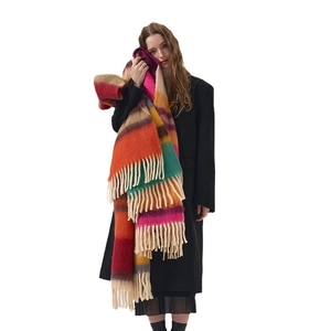Soft acrylic striped scarf with multi-color patterns and tassel fringe for winter warmth