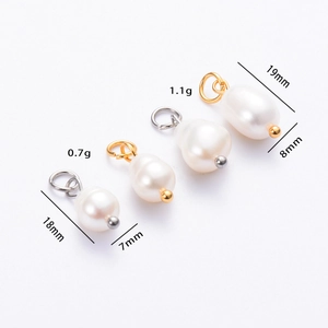 Detailed view of teardrop freshwater pearl pendants in 18x7mm and 19x8mm sizes