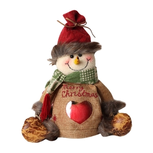 Christmas burlap snowman gift bag with heart-shaped apple window and Merry Christmas text