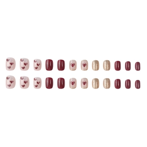 24-piece short square press-on nails in burgundy, gold glitter, and pink heart designs