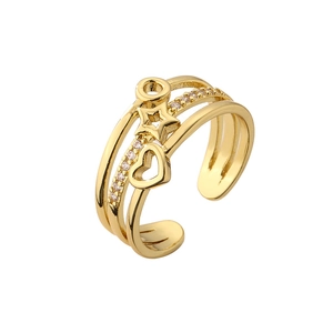 Elegant gold-tone layered ring with heart and star charms featuring cubic zirconia accents