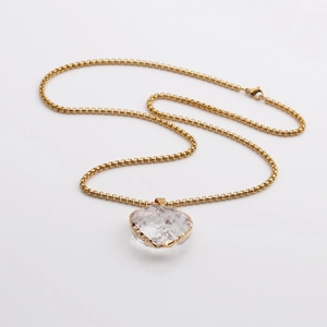 Minimalist gold box chain necklace with large transparent heart-shaped crystal pendant