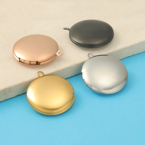 Polished round 316L stainless steel lockets in rose gold, gold, silver, and black finish