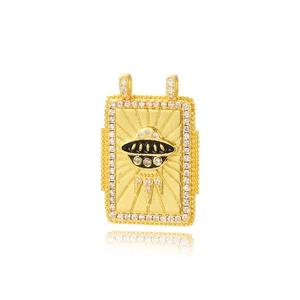 Detail of a gold rectangular UFO pendant with black enamel and crystal embellishments