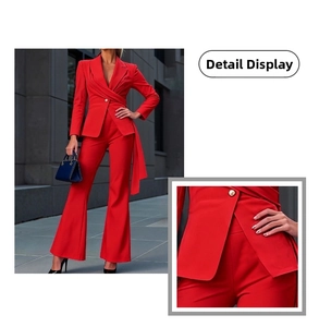 Detail of red blazer with single button closure and side tie strap design features