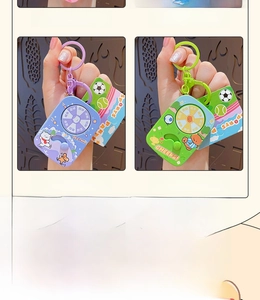 Luminous spinning keychain pendants in four colors with cartoon animal sports themes