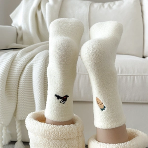 Warm fleece socks with cute cartoon embroidery for winter indoor lounging and sleep