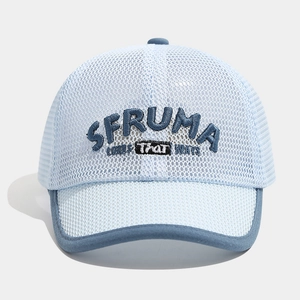 Detailed macro view of breathable light blue mesh fabric with SFRUMA letter embroidery