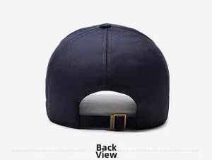 Rear view of navy blue cotton baseball cap featuring adjustable bronze metal buckle