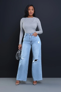 Women high waisted ripped wide leg jeans in light blue wash with stylish distressed details