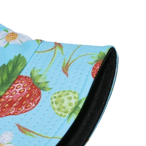 Detail of light blue bucket hat featuring strawberry prints and reinforced stitching