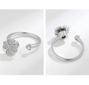 Detailed macro view showing the mechanical rotating structure of clover fidget ring