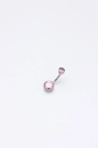 Macro shot of silver titanium belly ring featuring two pink cubic zirconia stones