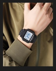 Detail of waterproof digital sports watch with square dial and 50m water resistance display