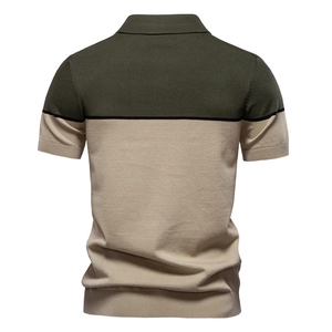 Detailed back view of men's knit polo shirt featuring green and beige color-block design