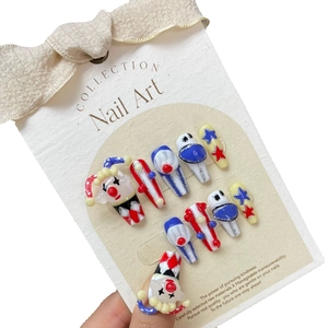 Handmade 3D clown circus theme press-on nails with red blue stripes and star patterns