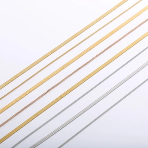 Double-layered snake bone chain necklaces in gold, silver, and rose gold finishes