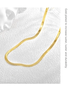 Detailed view of high-luster gold plated snake chain necklace with durable metallic finish