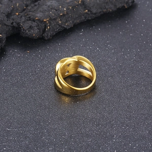 Macro shot of gold double-layered hollow chain ring showing side thickness and metal texture