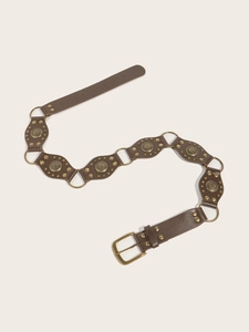 Detail of vintage brown PU leather belt with bronze rings and studded metal rivets